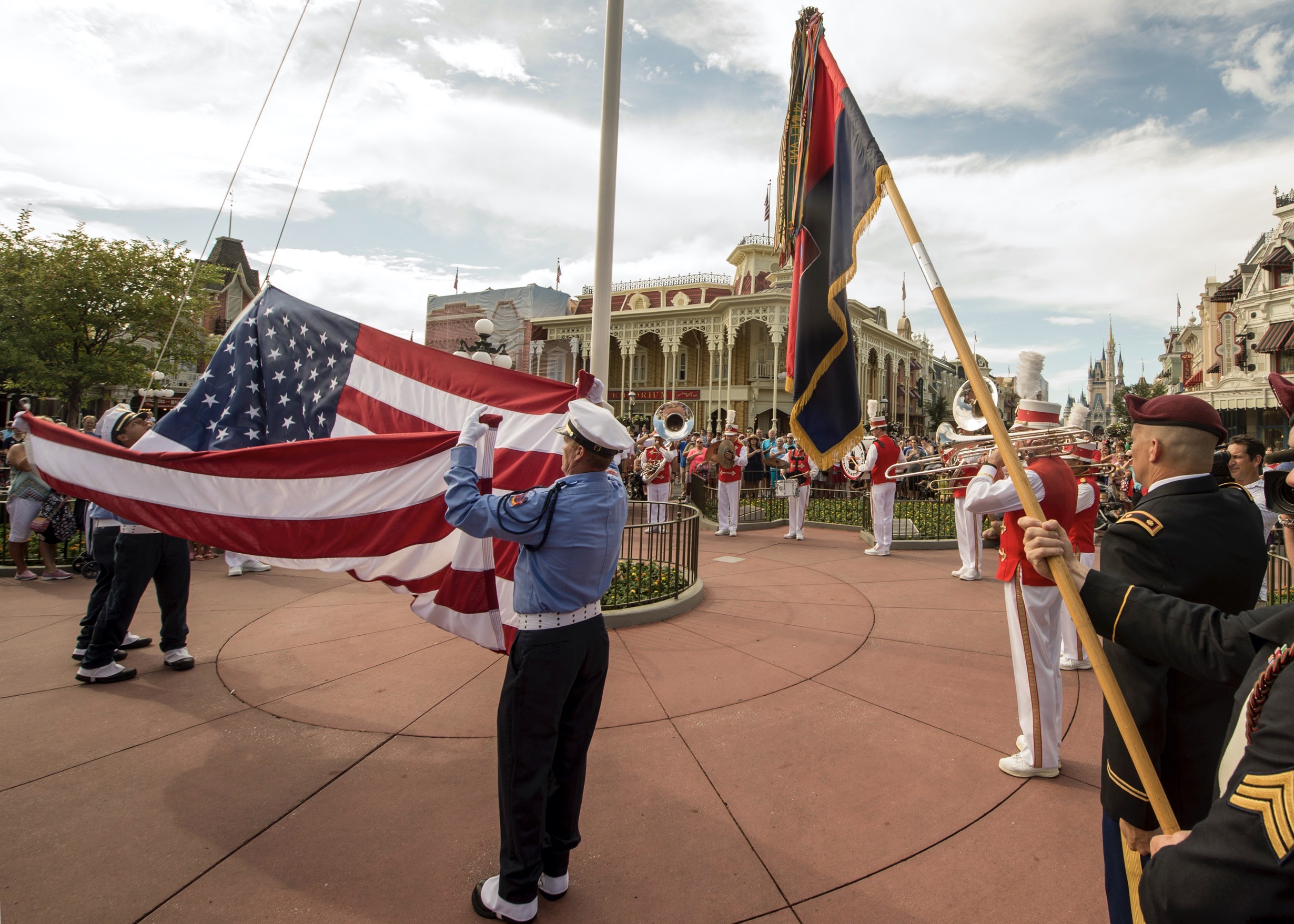 The U.S. Army’s 82nd Airborne Division, including veterans representing those who served from WWII until today’s conflicts in the Middle East, is honored during a special flag retreat ceremony at Magic Kingdom Park.
